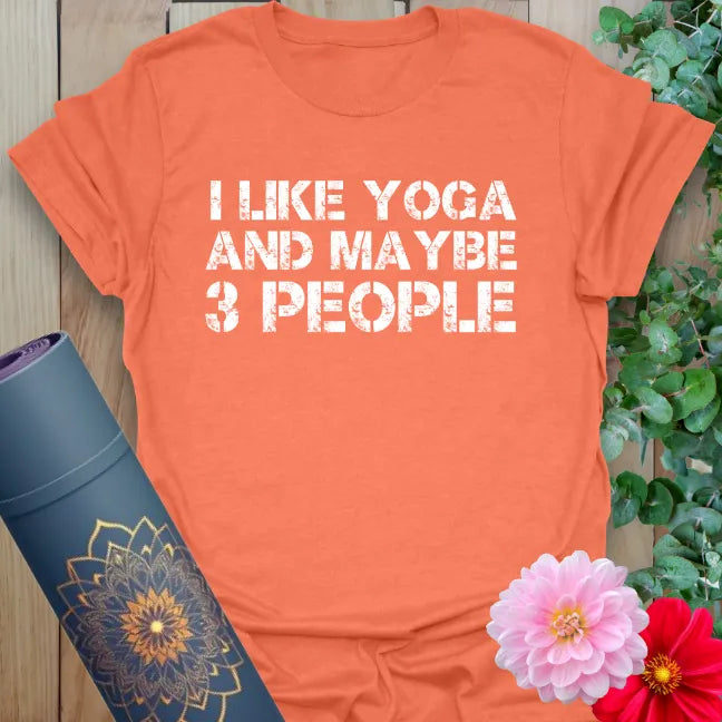 Vibrant orange yoga t-shirt showcasing funny yoga lifestyle quote for soulful humor and conscious movement.