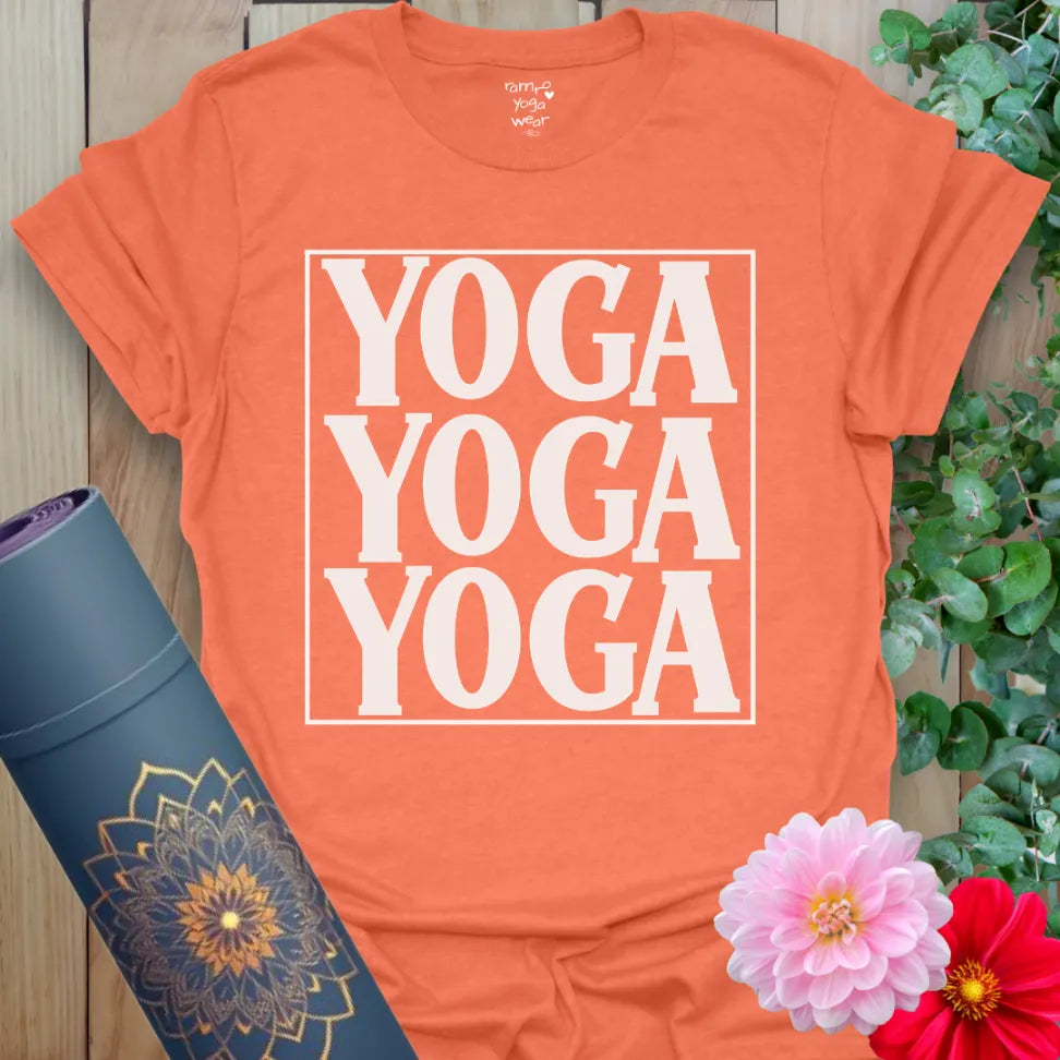 Vibrant orange yoga t-shirt showcasing bold "YOGA YOGA YOGA" design perfect for soulful movement and yoga lifestyle.