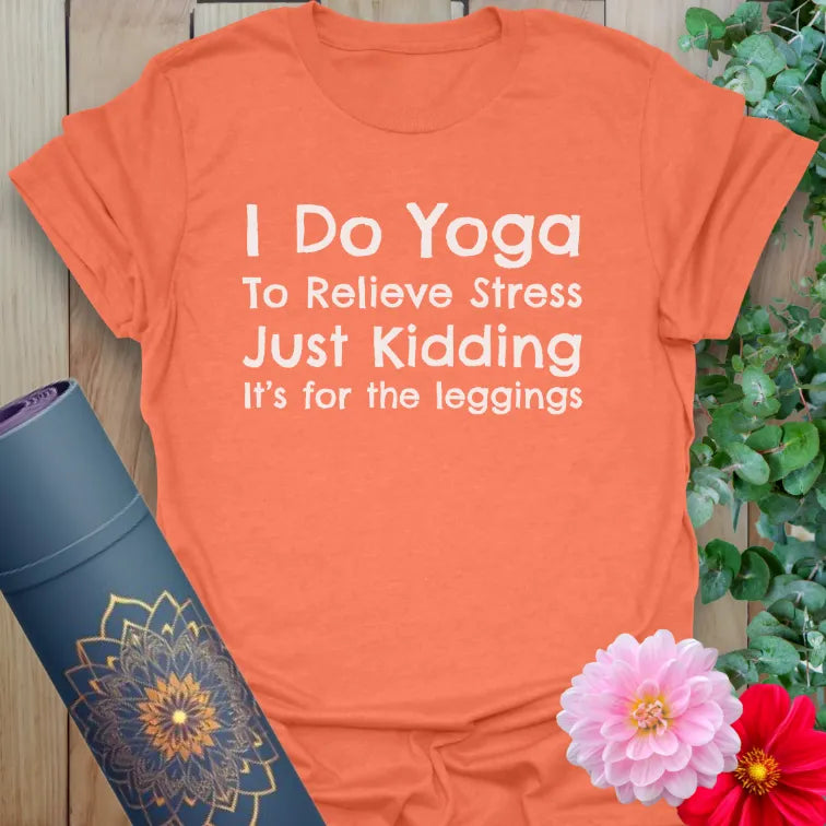 Vibrant orange yoga t-shirt showcasing funny yoga lifestyle quote perfect for light-hearted conscious movement.