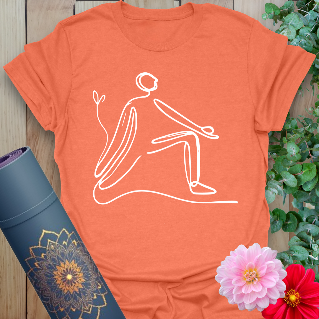 Vibrant orange yoga t-shirt showcasing elegant single-line lunge pose artwork for soulful, conscious flow.