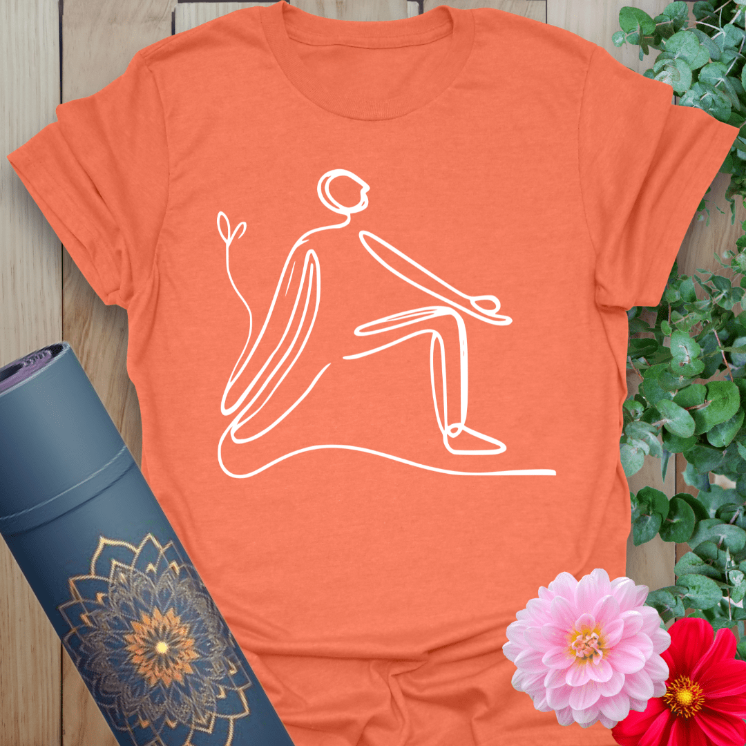 Vibrant orange yoga t-shirt showcasing elegant single-line lunge pose artwork for soulful, conscious flow.