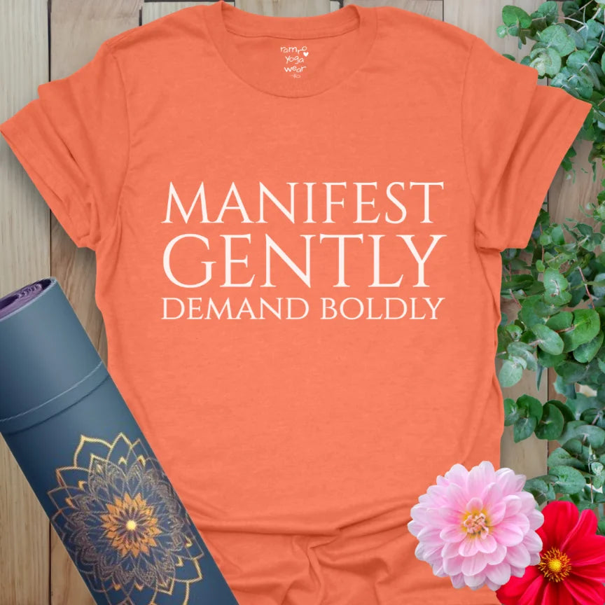 Bright orange yoga tee with minimalist affirmation for bold manifesting and mindful movement.