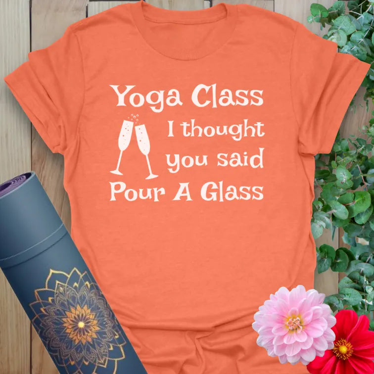 Vibrant orange yoga t-shirt showcasing humorous wine and yoga design inspiring soulful balance and lighthearted fun.