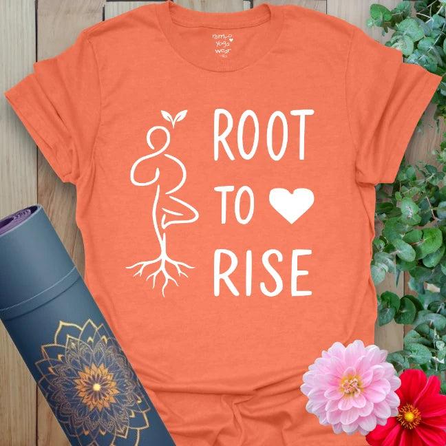 Vibrant orange yoga t-shirt showcasing inspirational rooted yogi design inspiring heart-centered, conscious movement.