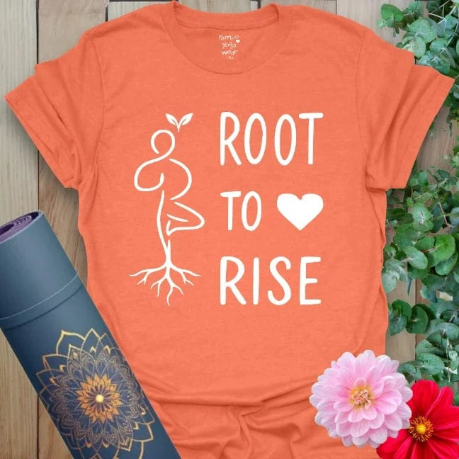 Vibrant orange yoga t-shirt showcasing inspirational rooted yogi design inspiring heart-centered, conscious movement.