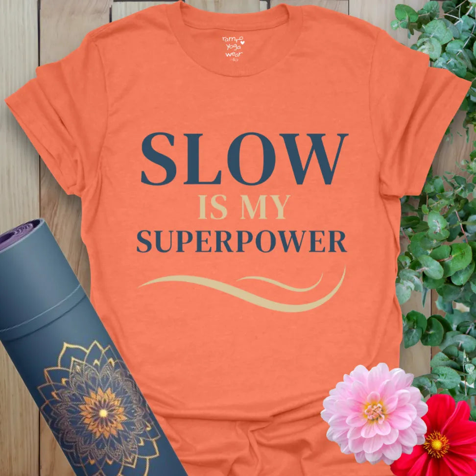 Heather Orange Slow T-Shirt with centered stacked typography and elegant linework. Soulful tee for grounded, slower living.