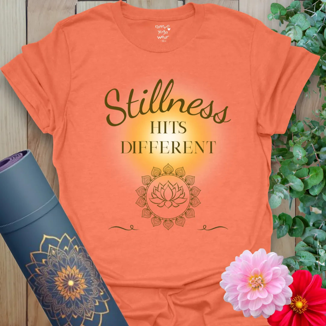 Heather Orange Stillness Hits T-Shirt with radiant energy and peaceful design. Bold yoga tee for sunny flow, stretching, or meditation.