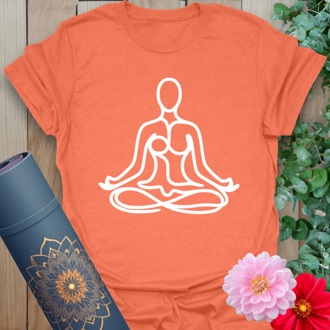 Vibrant orange yoga tee with double seated pose design for grounded movement and spiritual connection.