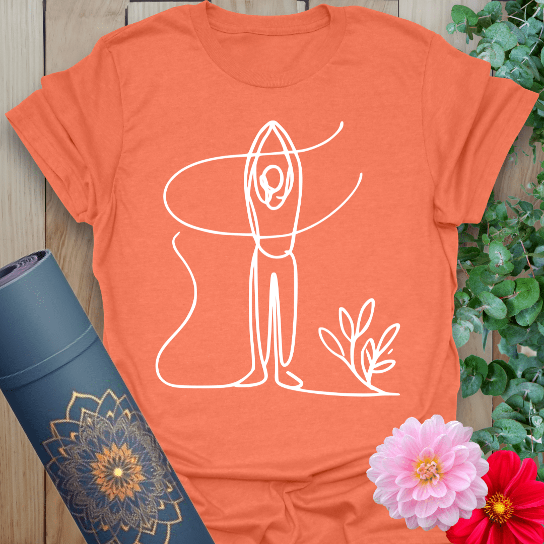 Vibrant orange t-shirt featuring one-line Tadasana pose and plant element for conscious, peaceful energy.