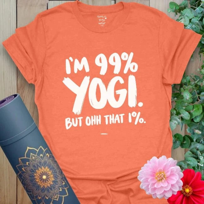 Vibrant orange t-shirt with cheeky yoga quote in bold lettering, perfect for mindful humor and movement.