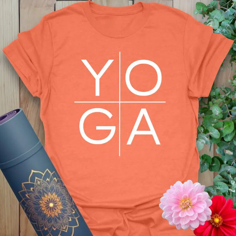 Vibrant orange yoga t-shirt featuring clean block-style “YOGA” lettering for mindful streetwear looks.