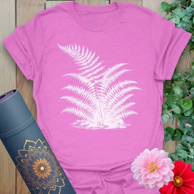 Radiant orchid-colored yoga tee with nature-inspired fern design celebrating mindful movement and natural beauty.