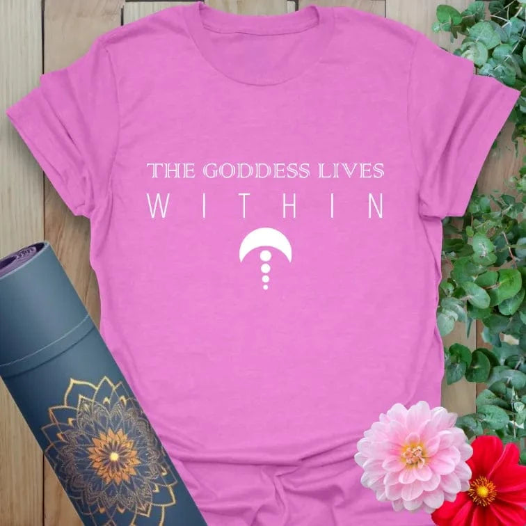 Radiant orchid-colored yoga tee with divine feminine "Goddess Lives Within" design inspiring conscious, heart-led movement.