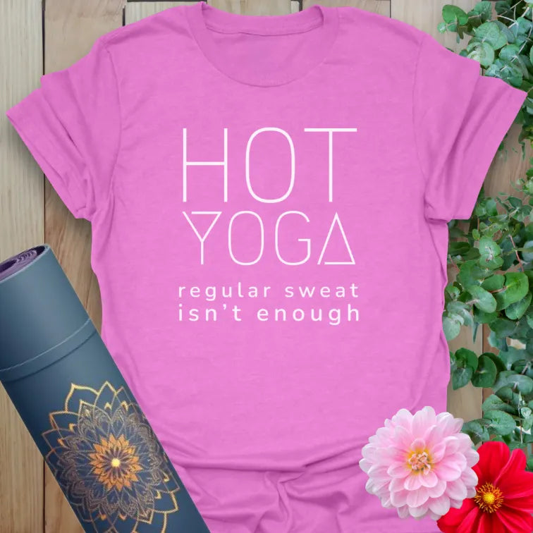 Radiant orchid-colored yoga tee with bold hot yoga graphic celebrating fiery, soulful practice.