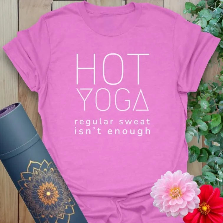 Radiant orchid-colored yoga tee with bold hot yoga graphic celebrating fiery, soulful practice.