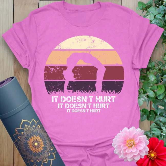 Radiant orchid-colored yoga tee with funny mindful movement quote and colorful retro sunset yogi artwork.