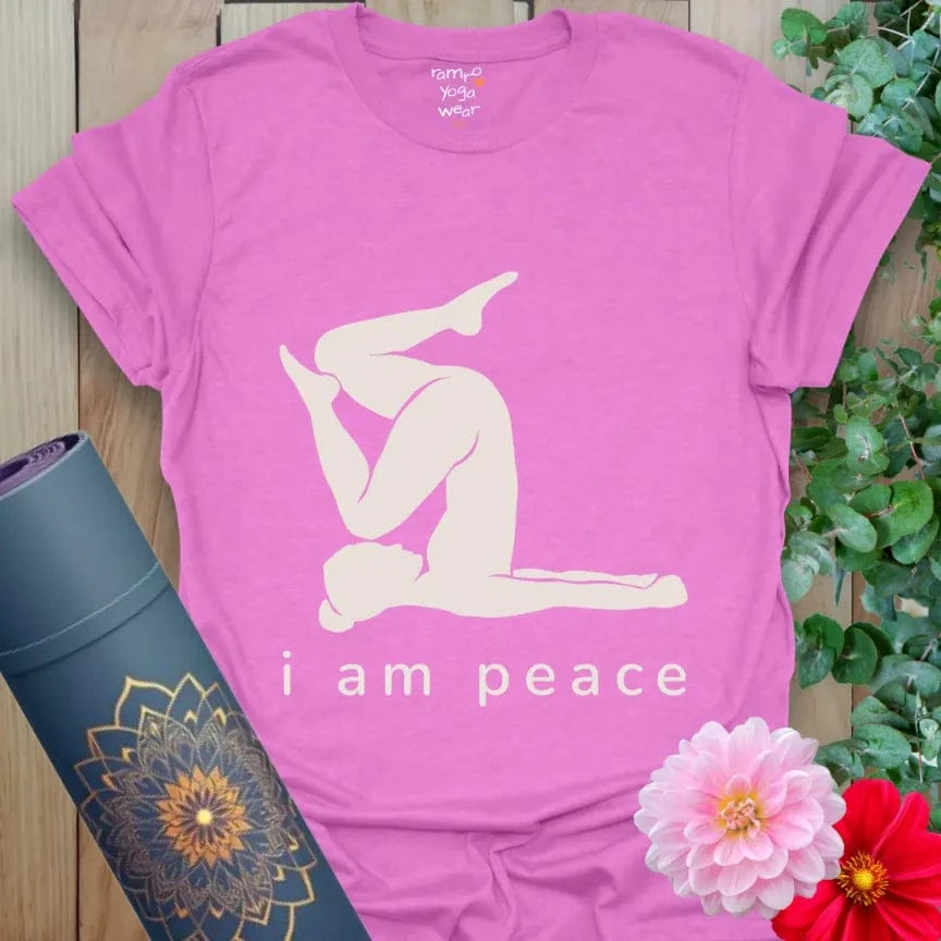 Heather Radiant Orchid tee featuring serene yoga pose line art and the words "i am peace."
