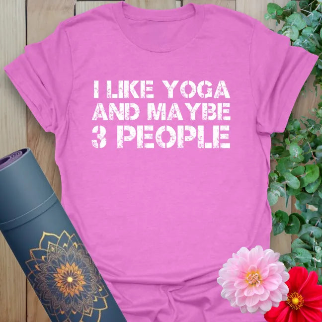 Radiant orchid-colored yoga tee with playful "I Like Yoga and Maybe 3 People" message for introverted yogis.
