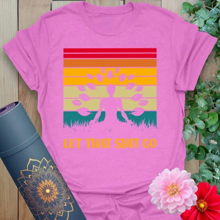 Radiant orchid-colored yoga tee featuring meditating figure, retro sunset, and funny mindful release message.