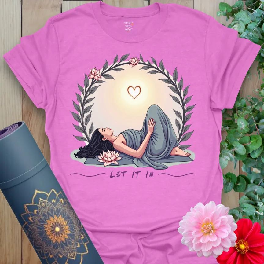 Radiant orchid-colored yoga tee featuring peaceful heart-opening pose and soulful sunrise design for mindful healing.