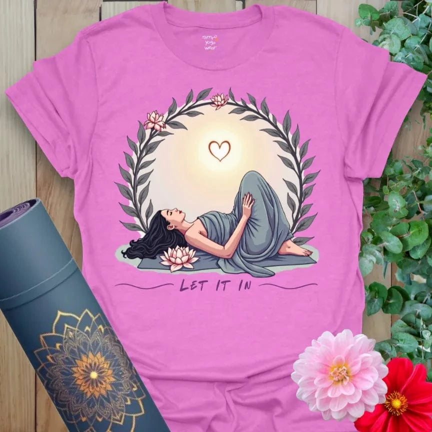 Radiant orchid-colored yoga tee featuring peaceful heart-opening pose and soulful sunrise design for mindful healing.