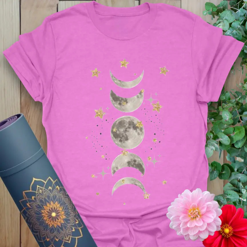 Radiant orchid-colored yoga tee with sacred moon phase design and stars symbolizing cosmic flow and spiritual growth.