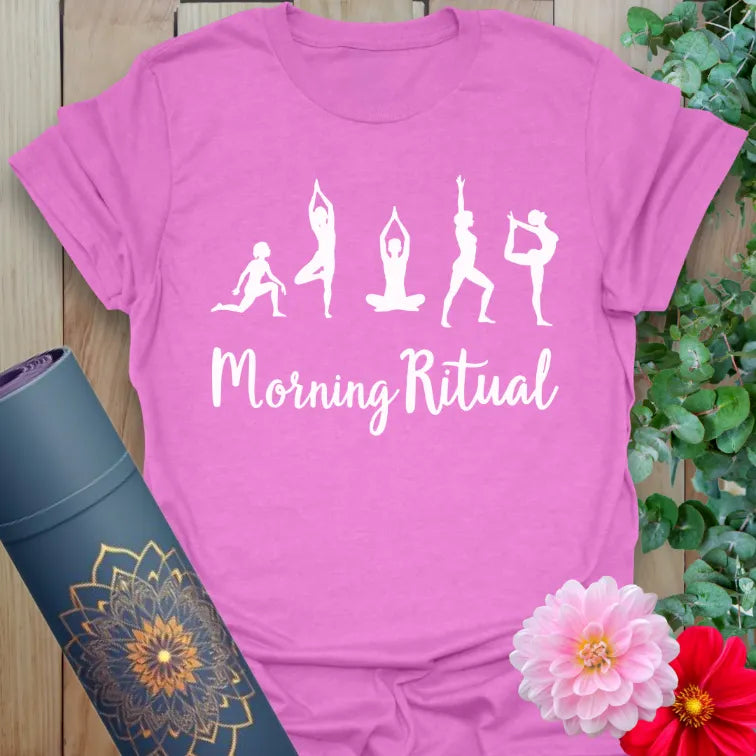 Radiant orchid-colored yoga tee with yoga practice figures and uplifting morning affirmation inspiring conscious movement and joy.