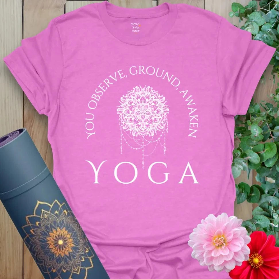 Radiant orchid-colored yoga tee with empowering mindfulness affirmation inspiring conscious movement and spiritual awakening.