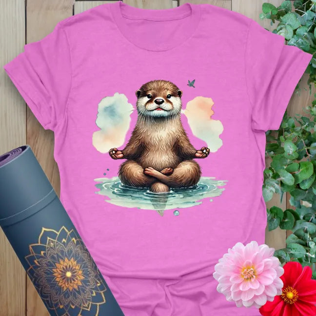 Radiant orchid-colored yoga tee with peaceful meditating otter design celebrating mindfulness, creativity, and light-heartedness.