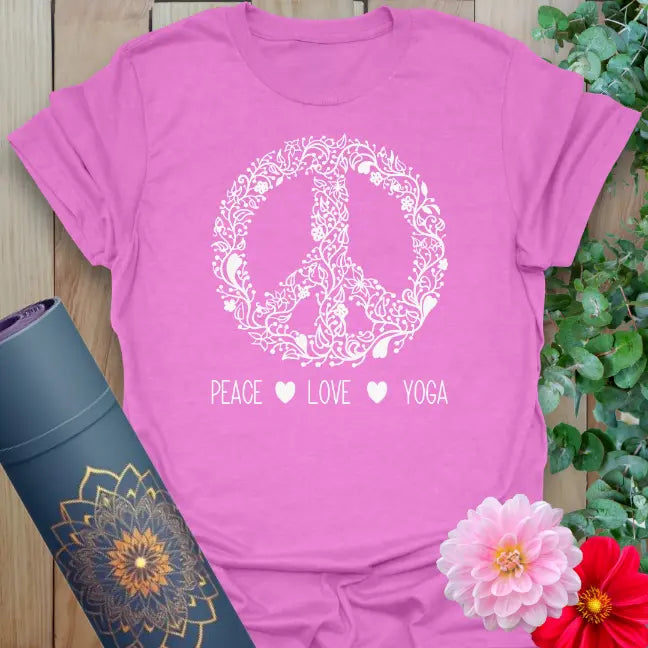 Radiant orchid-colored yoga tee with detailed peace sign artwork and uplifting "Peace Love Yoga" message.
