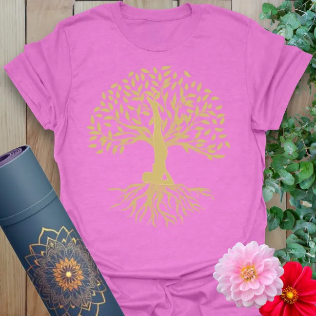 Radiant orchid-colored yoga tee with flourishing shoulder stand tree design inspiring soul-rooted strength and peaceful expansion.