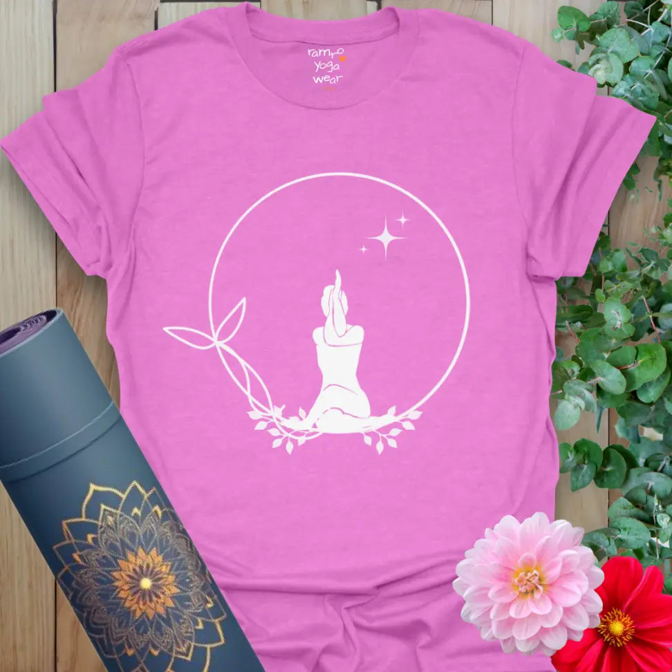 Heather Radiant Orchid Solitude T-Shirt featuring white meditating silhouette in leafy circle with stars. Yoga shirt for stillness and peace.