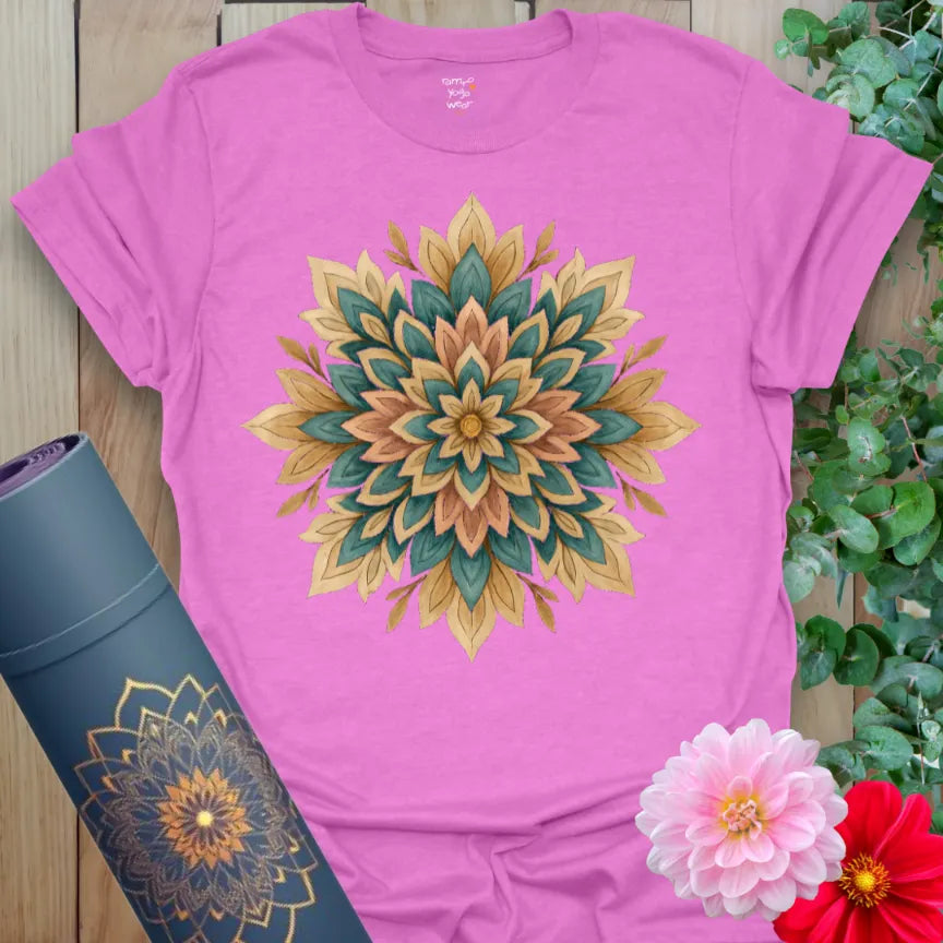 Radiant orchid-colored yoga tee with layered mandala flower design representing inner radiance and mindful living.