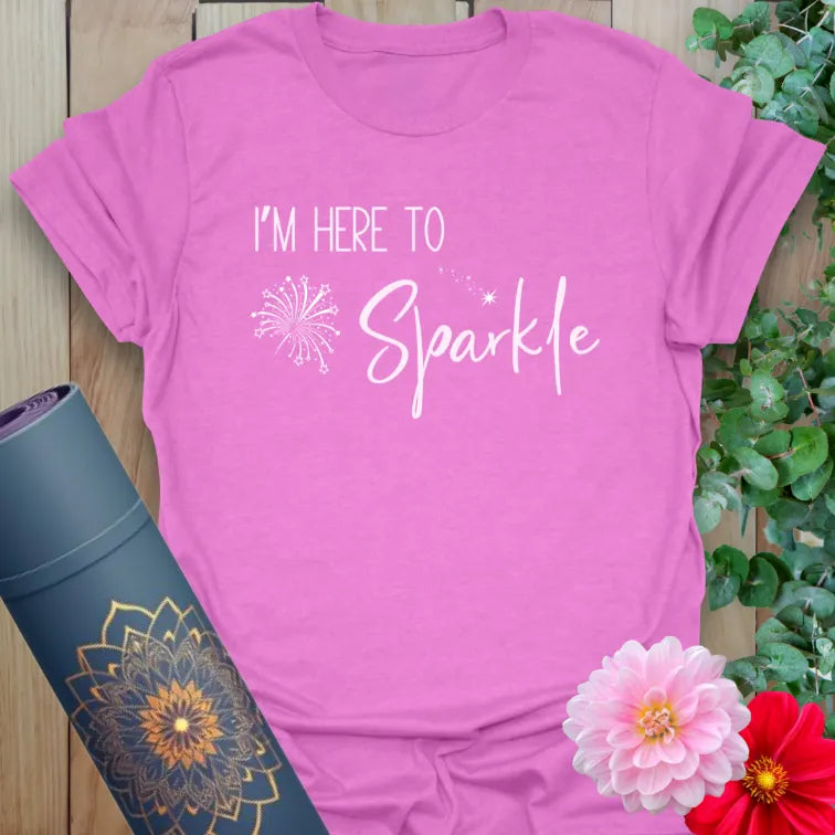 Radiant orchid-colored yoga tee with playful sparkle affirmation for light-filled, soulful living.