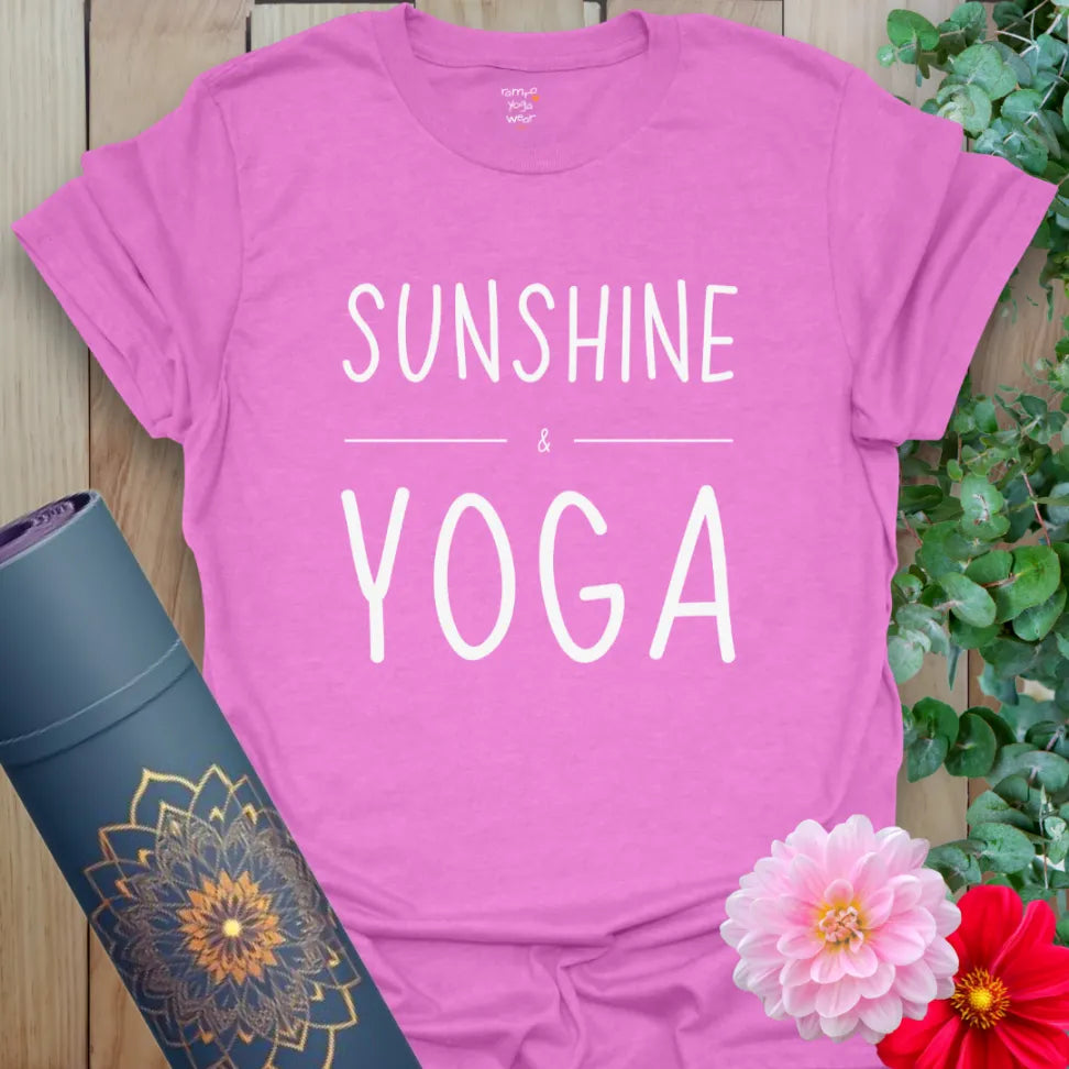 Radiant orchid-colored yoga t-shirt featuring uplifting “Sunshine & Yoga” text in soft script for bright everyday wear.