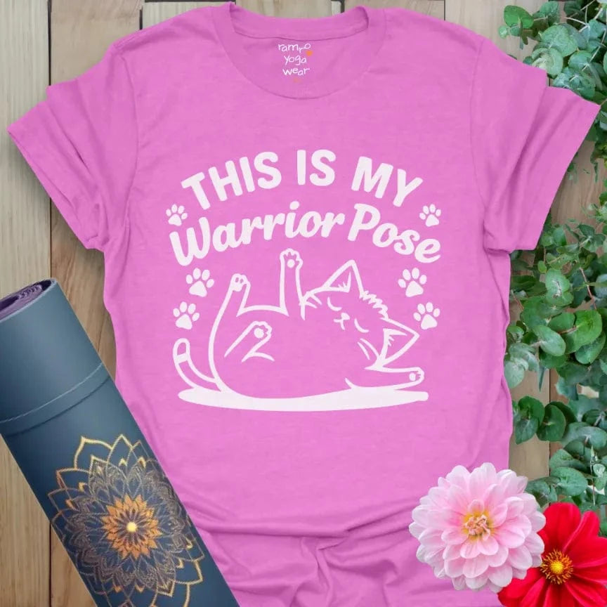 Heather Radiant Orchid Warrior Cat T-Shirt with a lounging cat illustration. Fun yoga gift for cat enthusiasts.