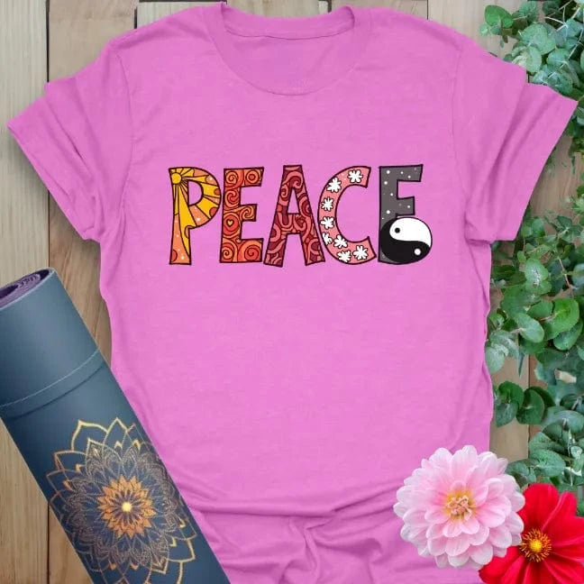 Radiant orchid-colored tee with illustrated peace typography and yin yang icon for harmony-driven wear.