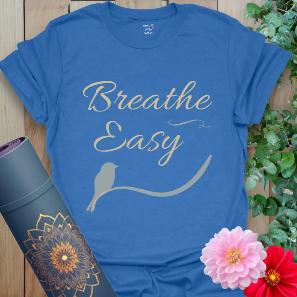 Heather Royal Breathe Easy T-Shirt featuring peaceful typography and soft movement graphic. Ideal for yoga lovers and breathwork practitioners.