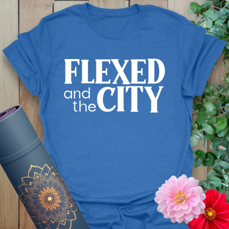 Soft cotton unisex yoga t-shirt featuring bold "Flexed and the City" graphic for playful, empowered living.
