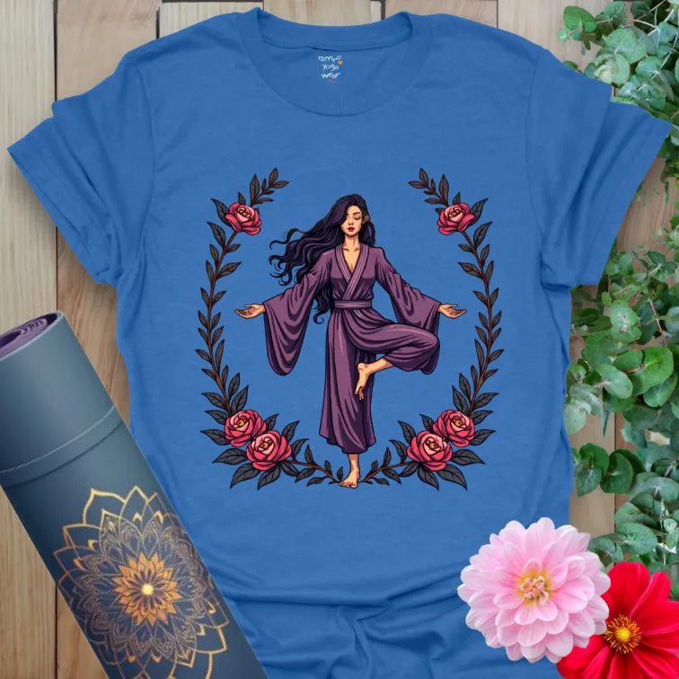 Soft cotton unisex yoga t-shirt featuring graceful yogi framed by blooming roses symbolizing freedom and mindful living.