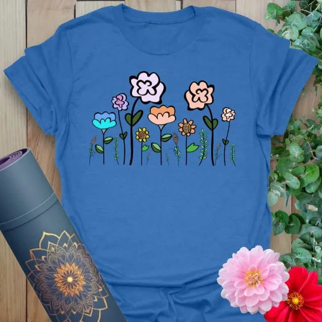 Soft cotton unisex yoga t-shirt featuring colorful whimsical wildflower illustration symbolizing joy and mindful growth.