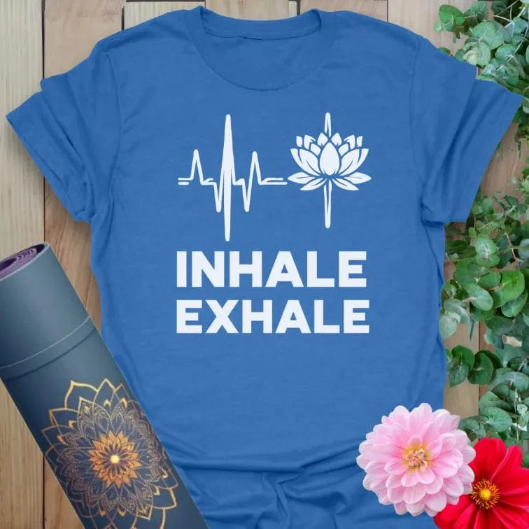 Soft cotton unisex yoga t-shirt featuring heartbeat line and lotus flower design with "Inhale Exhale" mindful breathing mantra.