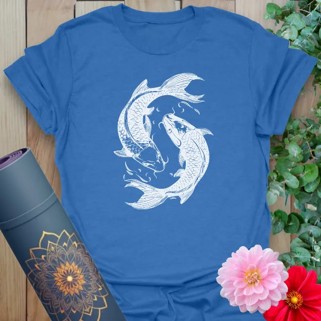 Soft cotton unisex yoga t-shirt featuring graceful koi fish yin-yang design symbolizing balance, resilience, and mindful flow.