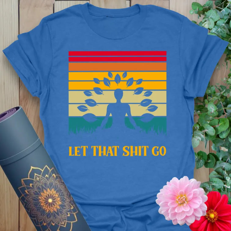 Soft cotton unisex yoga t-shirt featuring retro sunset, meditating yogi, and bold "Let That Sht Go" mindfulness quote.