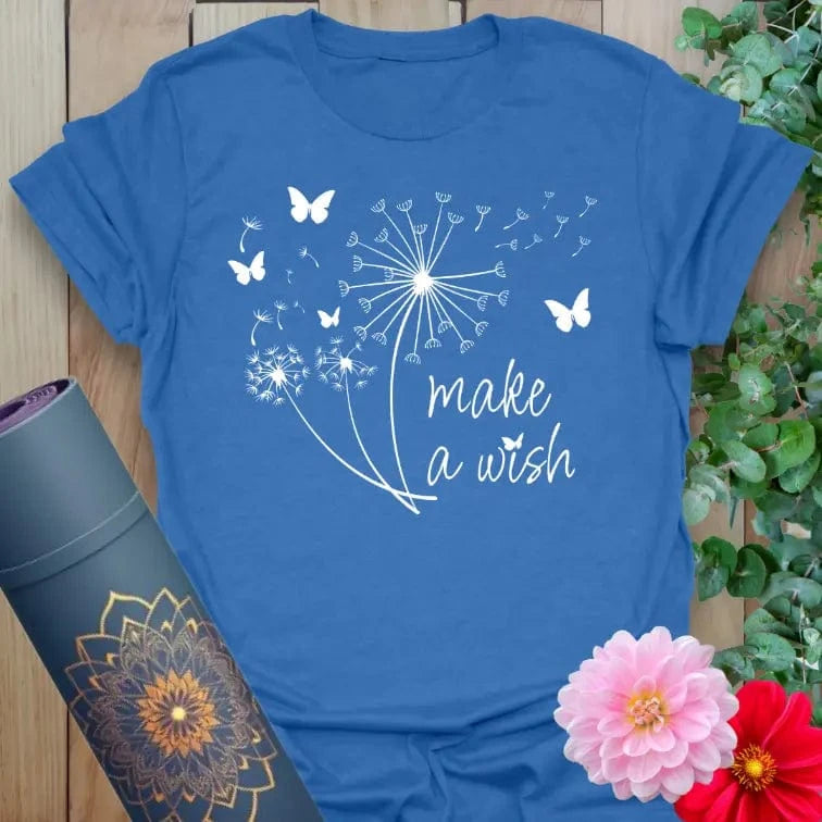 Soft cotton unisex yoga t-shirt featuring whimsical dandelion, butterflies, and "Make a Wish" design symbolizing hope and mindful manifestation.