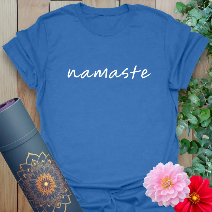 Soft cotton unisex yoga t-shirt featuring minimalist handwritten "namaste" script symbolizing conscious, soulful living.