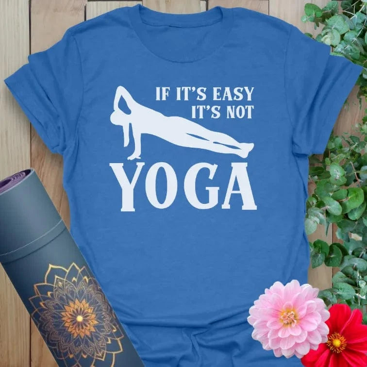 Soft cotton unisex yoga t-shirt featuring bold "If it’s easy, it’s not yoga" quote and dynamic pose inspiring mindful strength and soulful resilience.