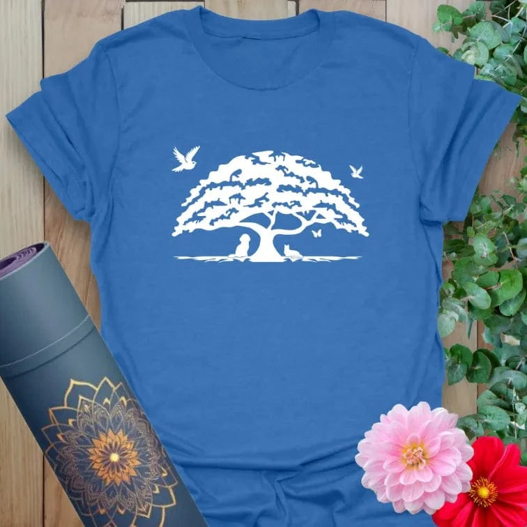 Soft cotton unisex yoga t-shirt featuring majestic oak tree and soaring birds symbolizing grounded strength, soulful growth, and mindful freedom.