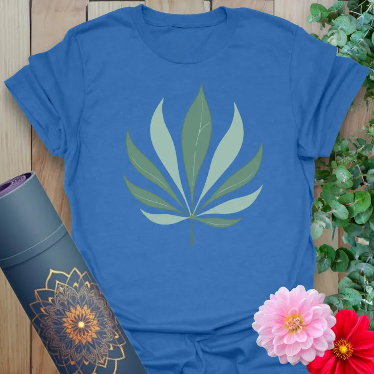 Soft cotton unisex yoga t-shirt featuring elegant two-tone palm leaf design symbolizing balance, growth, and mindful nature living.