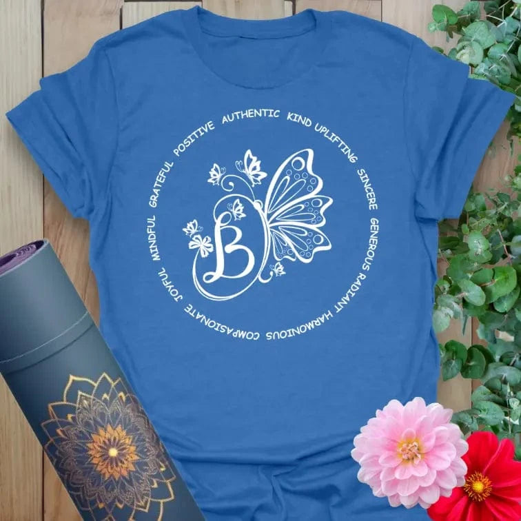 Soft cotton unisex yoga t-shirt featuring butterfly and floral design encircled by positive affirmations for soulful, mindful living.